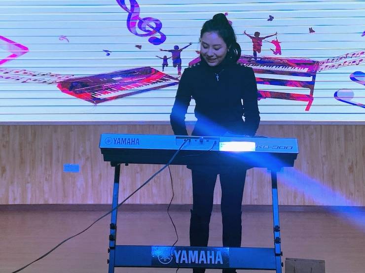 让音乐陪伴成长 狗万乐器捐赠爱心行动走进重庆市长寿区江南九年制学校